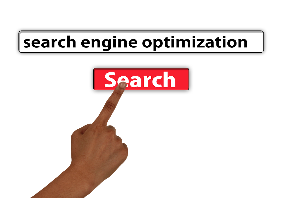 finger pushing a search engine optimisation box
